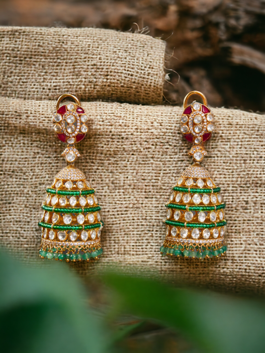 Polki & Diamond Jhumki with red utrai & green cheed Jhumki with green drops.