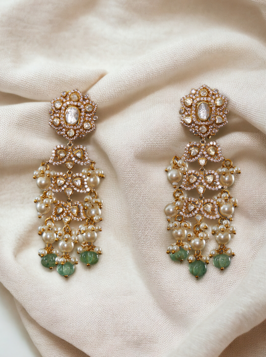 92.5 silver Vellore polki leaf motif earring with green carved pumpkin drops & fresh water pearls.