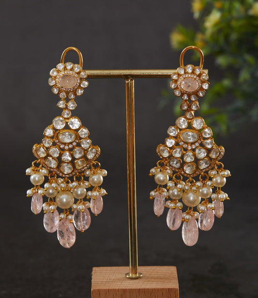 Featuring an 18kt gold plated 92.5 silver Vellore polki earring with Rosequartz and fresh water pearls.