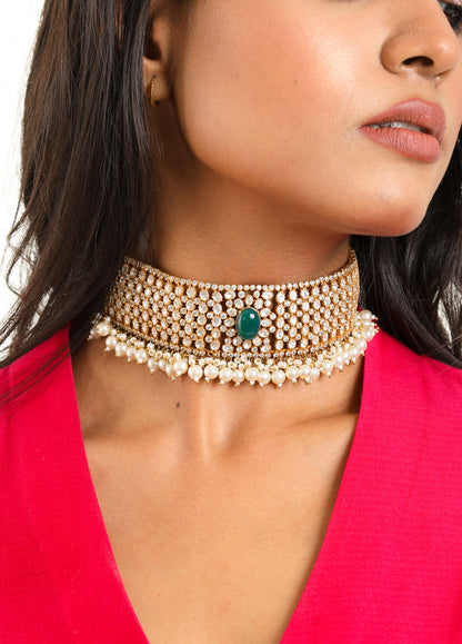 Silver Vellore Polki Choker with Green Oval Stone and Fresh Water Pearls.