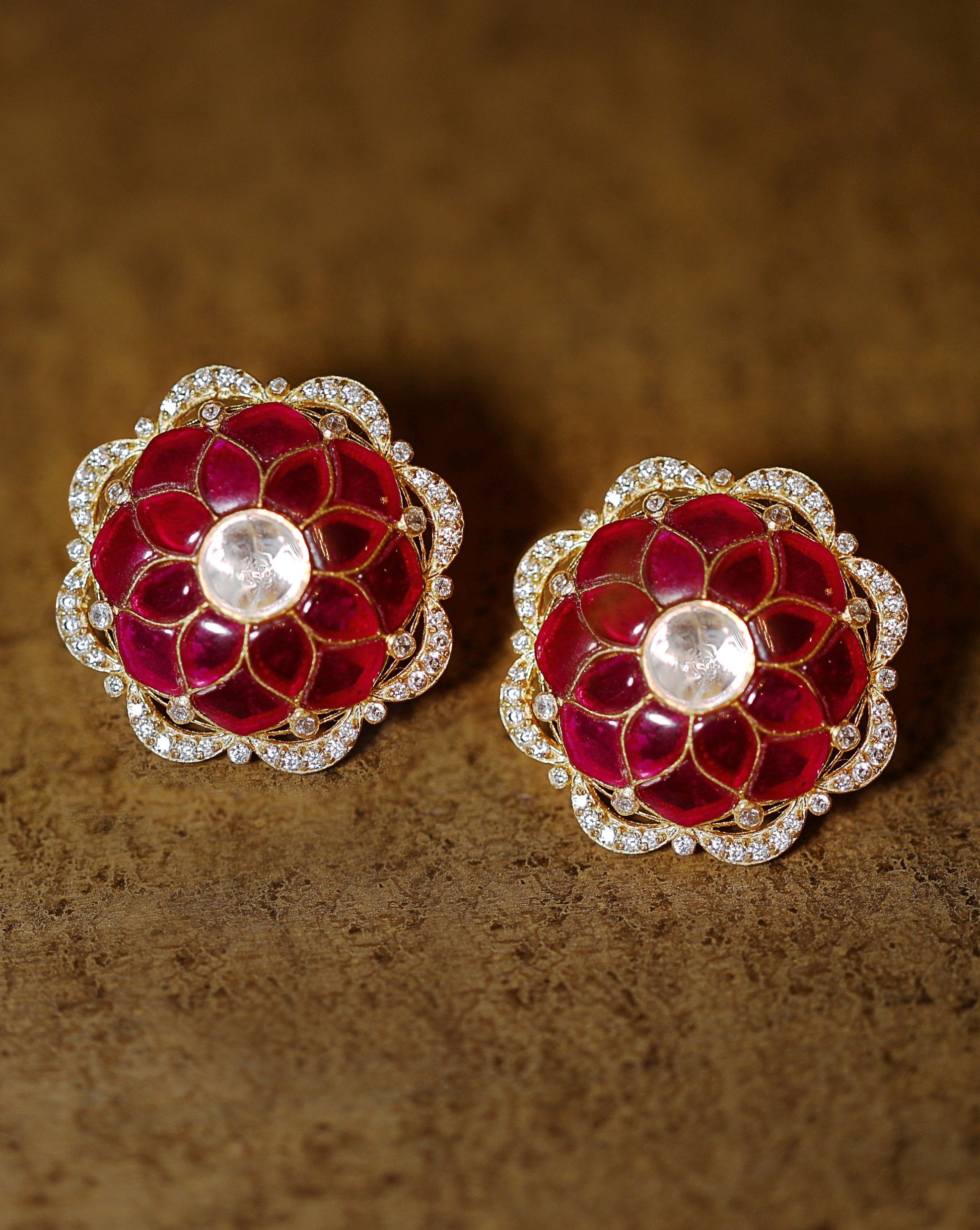 Featuring a pair of 18kt Gold plated Polki and Red Stone with Pearl Drops set in 92.5 Silver 