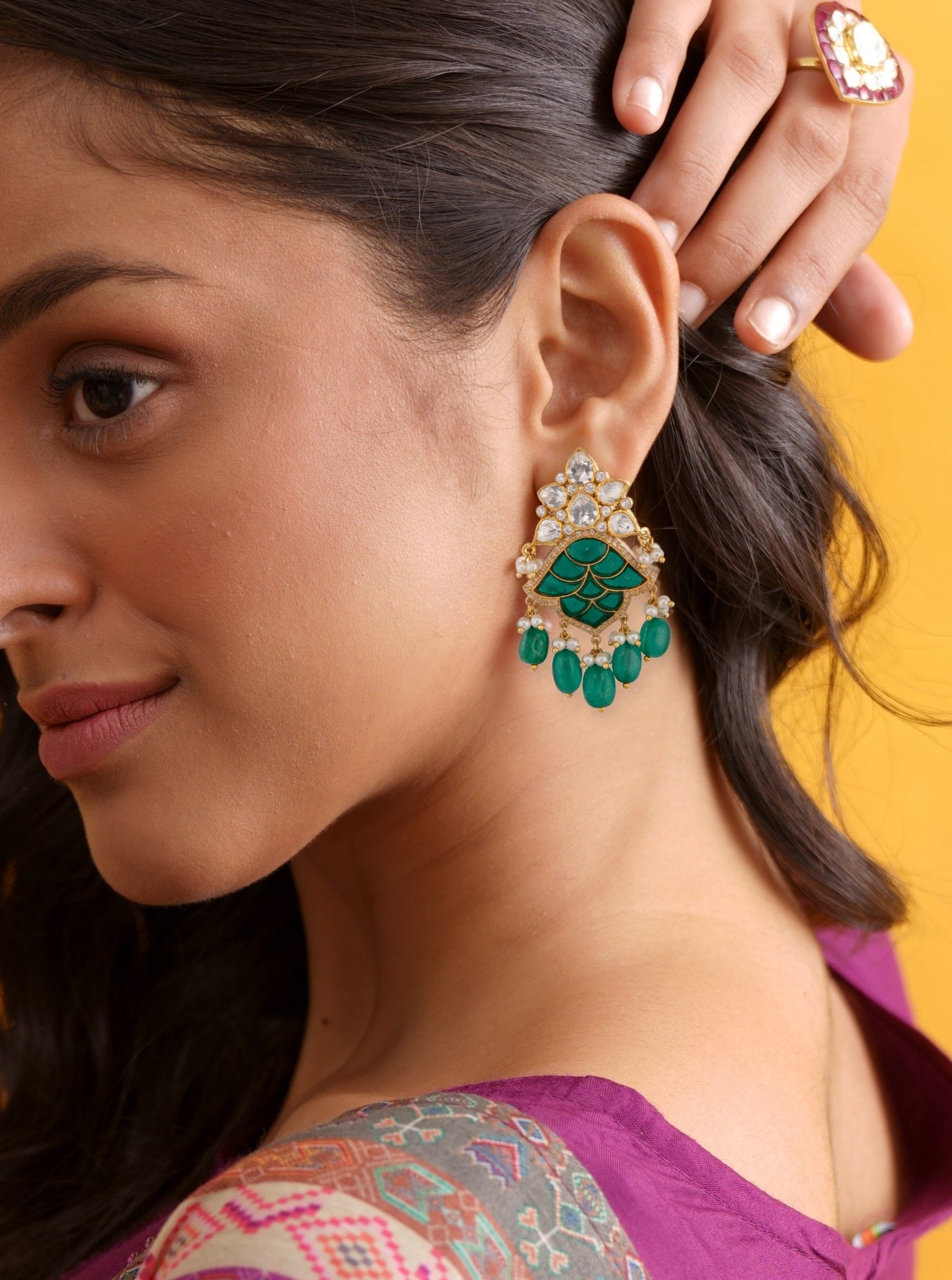 green emerald dangler earrings.