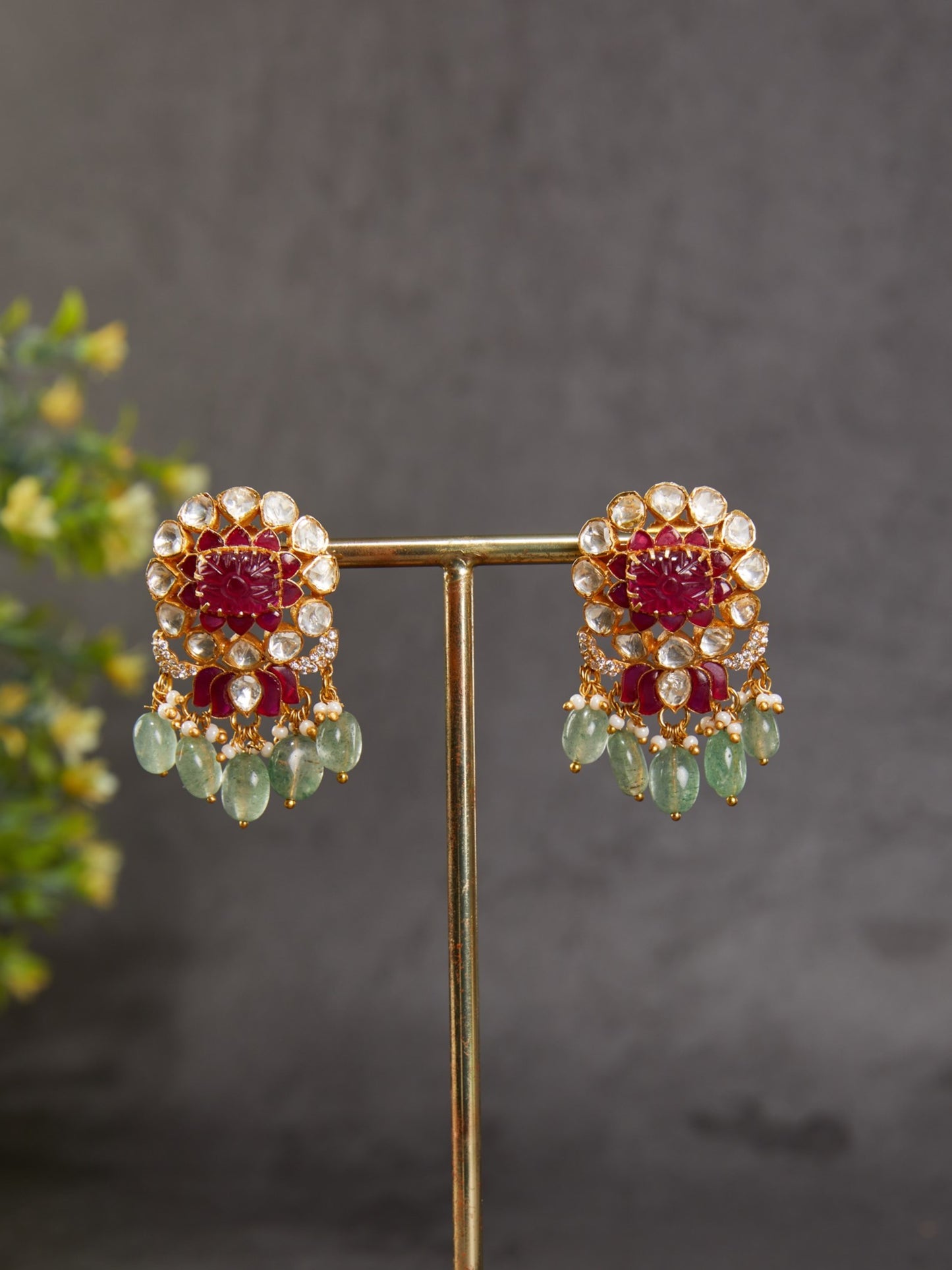 92.5 silver polki square motif red carved stone ear studs with red utrai lotus motif & green drops.